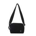 Minimalist black canvas crossbody bag with wide adjustable shoulder strap and metal logo - Black