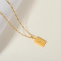 Close-up of gold stainless steel necklace with square starburst pendant and zircon - Gold-Zirconia Eight-Pointed Star Square Pendant
