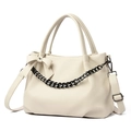Chic cream beige leather handbag featuring a bold black chain and bow decorative detail - Off White