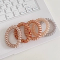 5-pack stylish spiral hair ties in checkerboard and solid colors on a laptop keyboard - 3# Orange Spiral (5pcs Set)
