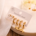 Tres pares de pendientes de acero inoxidable con circonitas y colgantes de pez en tarjeta - Oro/Conjunto de Circonita de Pez
