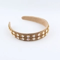 Close-up of beige baroque headband with double-row sparkling crystals and rhinestones - Champagne