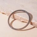Detailed view of a translucent grey acrylic bangle on a textured stone display stand - Gray Thin Style (10#)