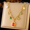 Dettaglio collana dorata vintage con pietre preziose e ciondoli a forma di occhio - Stile Gemma Colorata Stella Occhio (N3218)