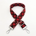 Close-up of star pattern knit bag strap with silver metal lobster clasps and buckle - Coffee Base Red Star Silver Buckle