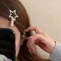 Silver Y2K metal star-shaped shark hair claw clip worn on hair for a stylish look - Silver Hollow Five-Point Star (FJ1804)