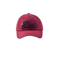 Detail of vintage burgundy baseball cap featuring classic navy embroidery and distressed holes - Burgundy
