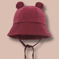 Detailed texture of dark red cotton baby bucket hat with cute 3D bunny ears and chin straps - 3-12M / Burgundy
