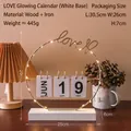 Golden iron circle calendar lamp with love lettering and white wooden base - Love White Base Calendar