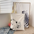 White canvas tote bag featuring cute cartoon bear with ice cream print design - White with Ice Cream Bear