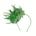 Detailed view of a green fascinator headpiece with elegant feathers and beadwork - Green