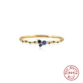 Detailed macro view of S925 sterling silver gold ring featuring tiny blue turquoise stones - Blue Zirconia Cluster Gold Style (Style 6-Blue)