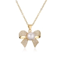 Elegant 18K gold plated bow necklace with a white pearl and sparkling zircon pendant - Gold Bowknot Pearl