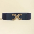 Detail of navy elastic belt featuring golden double-C buckle with embossed texture - Navy Blue