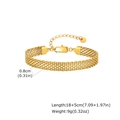 Detail of golden mesh bracelet showing the woven texture and lobster clasp with extender - 8mm*18-23cm / Gold