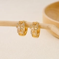 Detail shot of gold-plated butterfly hoop earrings with white zircon on a branch - Layered Butterfly(EH410005)