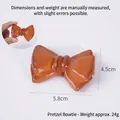 Realistic PVC brown pretzel model with bow, 5.8cm size pendant for bags and keychains - Bowknot Pretzel - No Hook