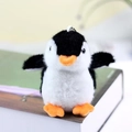 Cute black and white plush penguin keychain with orange beak for backpacks and school bags - Black / 10cm
