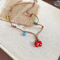 Collana con ciondolo a forma di mela colorata e ciondoli a cartoni animati - Collana-Marrone-Rosso-Mela
