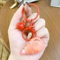 Cute pink liquid quicksand backpack keychain with a red bell and lobster clasp charm - Mini Ice Cream Milk Bean - Red