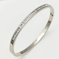 Silver stainless steel bangle with channel-set square crystals in a minimalist design - Steel Silver Tone Square Zirconia Style (29-D-12)