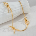 Collier minimaliste en maille serpent dorée avec trois détails de nœuds pour femme - Doré