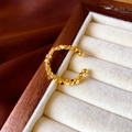 Macro view of gold-plated multifaceted bead ring on white velvet and silk background - Multi-faceted Bead String Style (24#)