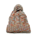 Detailed macro view of chunky cable knit texture and faux fur pompom on gray winter hat - Gray Mixed