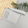 Slim light grey faux leather card holder with zipper pocket and wrist strap - 019 Light Blue