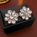 Detailed view of flower-shaped earrings with crystal petals on a black jewelry box - 1# Silver Earring Post Gold Flower Rhinestone Stud Earrings