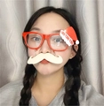 Close-up of Christmas party glasses with red frame, Santa hat and white beard pendant - Watermelon Red / Bearded Christmas Glasses