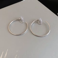 Polished silver hoop clip-on earrings with clear silicone pads for non-pierced ears - 4cm / Silver / Clip-On Earrings