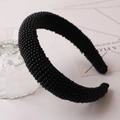 Close-up of a handmade black beaded headband with thick texture and smooth inner lining - Style 6 (Black Simple Beaded)