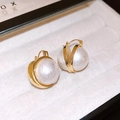Detail of vintage gold pearl hoop earrings with elegant double metal wrap design - Gold Pearl Ear Buckle