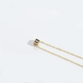 Minimalist gold necklace with square black enamel pendant featuring letter E engraving - Letter E