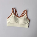 High-impact sports bra in cream and caramel with double straps and cross-back design - S / Tops / Ivory