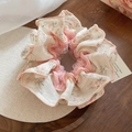 Detailed shot of floral lace hair scrunchie with pink trim on wooden tray - Cream Pink Floral Lace (14#)