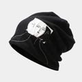 Black knit beanie with waffle texture and abstract face patch in streetwear style - M (56-58cm) / Black