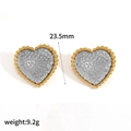 Detail view of heart stud earrings with gold beaded edges and silver hammered texture - Mixed Color Vintage Hammered Heart Style (TE60426-M)