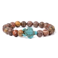 Natural landscape stone bead bracelet featuring a turquoise sea turtle charm pendant - Leopard Skin Jasper