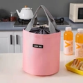 Pink cylindrical lunch bag with drawstring closure and gray handle for thermal meals - Pink