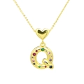 Close-up of golden letter Q pendant with multi-colored cubic zirconia and heart bail - Letter-Q