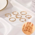 Set di 7 anelli placcati in oro con motivi stella e luna e cristalli lucidi - Set Di Anelli Impilabili Oro Stella Luna Con Strass (9861)