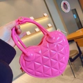 Close-up of pink heart-shaped PVC jelly bag with quilted texture and sturdy handle - 17*5.5*11cm / Rose Red