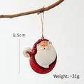 Vintage metal Santa Claus hanging ornament with 9.5cm height and rustic finish - Santa Claus Left