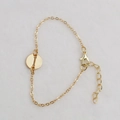 Golden chain bracelet featuring a hollow round pendant with capital letter I engraving - Gold I