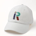 Close-up of premium white cotton baseball cap with intricate iR letter embroidery and smiley - Adjustable / White
