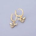 Macro shot of 18K gold bee drop earrings featuring black and white cubic zirconia and S925 stamp - Bee Black Zircon Earrings-Gold