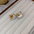 Elegant C-shaped golden hoop earrings with pearlescent white textured drop charms - White Bean Hoop (Real Gold Plated)