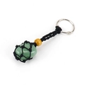 Detailed view of natural green raw stone wrapped in black woven mesh for keychain - Black Rope + Green Aventurine